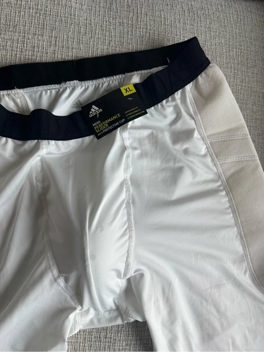 adidas Men’s performance slider with protective cup